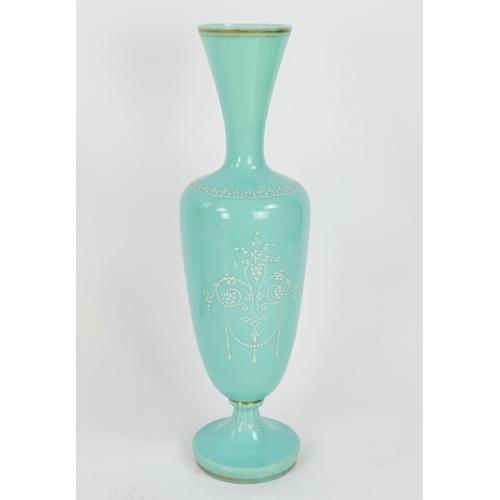 1716 - A Victorian pale green glass vase, of ovoid form with flared neck with white overlay decoration of a... 