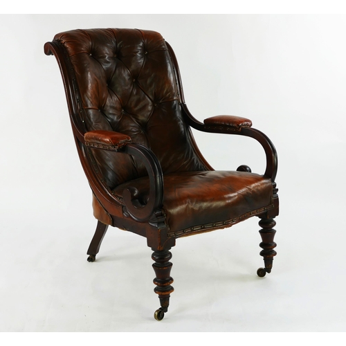 1725 - A 19th century mahogany elbow chair, with button down scroll back, stuff-over seat, on ring turned l... 