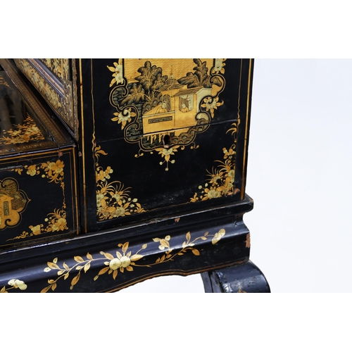 1728 - A late 19th century Chinese export lacquered writing desk, decorated all over with figures in pagoda... 