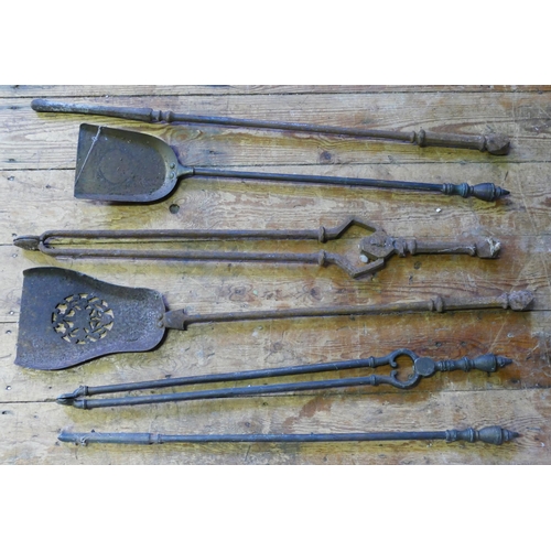 1435 - A collection of Georgian and later fire irons, including poker, shovel etc.