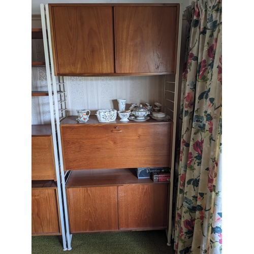 1463 - A three section vintage Ladderax shelving unit, with five cupboard units and three open shelves, hav... 