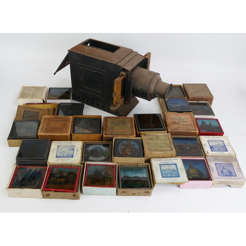 1560 - A late Victorian magic lantern, together with boxed part sets of slides including Views of London, O... 