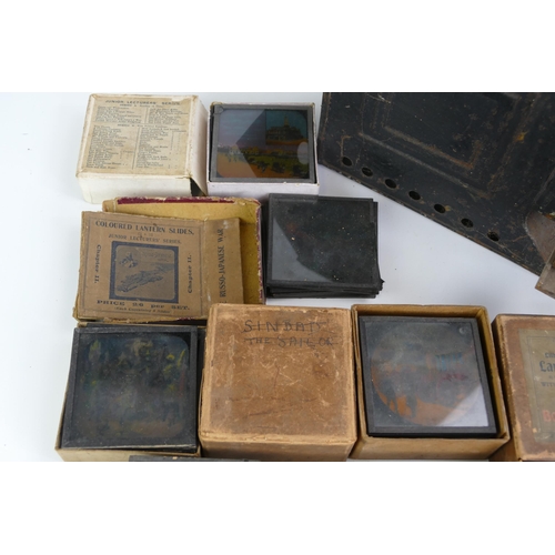 1560 - A late Victorian magic lantern, together with boxed part sets of slides including Views of London, O... 