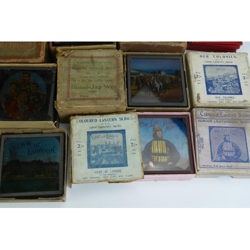 1560 - A late Victorian magic lantern, together with boxed part sets of slides including Views of London, O... 