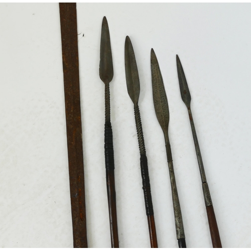 1623 - A collection of five assorted African tribal spears, with wood shafts. 176cm, 148cm, 144cm and 137cm... 