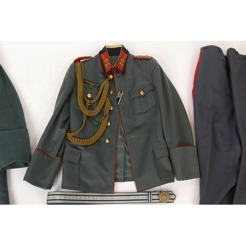 1631 - A World War II period Wehrmacht Brigadier General uniform, includes over coat, tunic, trousers, shoe... 