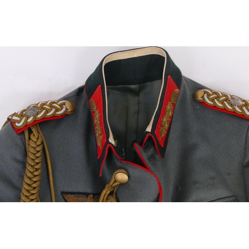 1631 - A World War II period Wehrmacht Brigadier General uniform, includes over coat, tunic, trousers, shoe... 