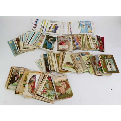 1679B - A collection of Edwardian and later loose postcards including risqué cards by Taylor, topographical,... 