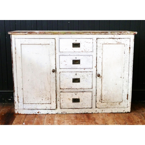 1731 - A painted pine dresser base, with rectangular top, containing four graduated drawers flanked by cupb... 