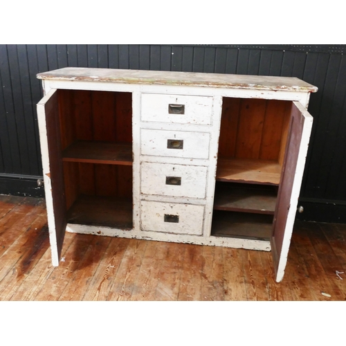 1731 - A painted pine dresser base, with rectangular top, containing four graduated drawers flanked by cupb... 