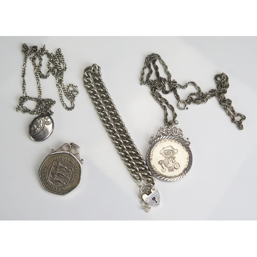 279 - A Silver Curb Link Bracelet, silver locket on chain and two coin pendants, 52.1g weighable silver