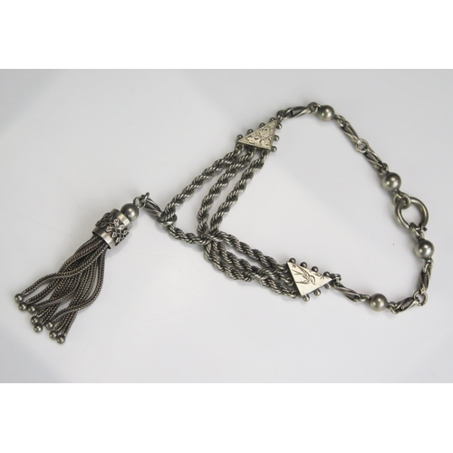 281 - A Victorian Precious White Metal Bracelet with tassel and chased decoration, 20g