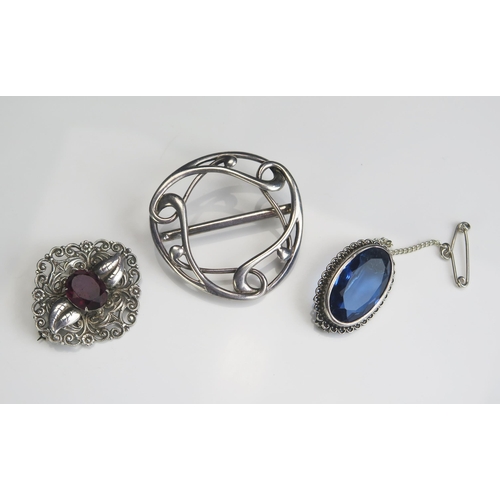 285 - A Scottish Silver Scarf Brooch and two others, 26.74g