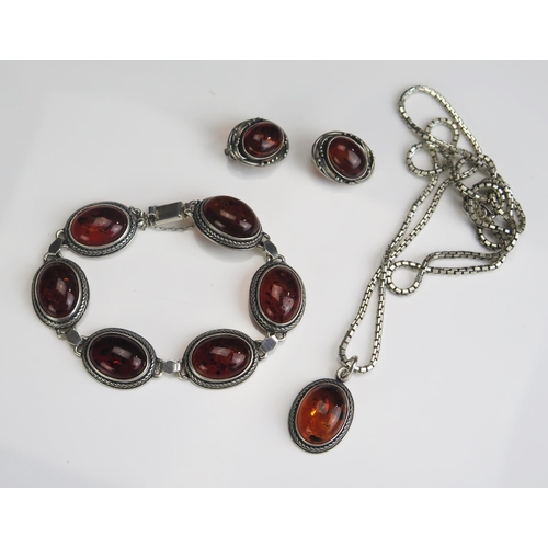 287 - A Silver and Amber Bracelet, Earrings and Pendant on Chain, 52.49g