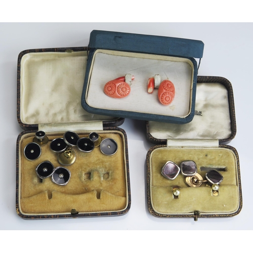 288 - A Pair of Carved Coral Cufflinks and two boxes of studs and cufflinks