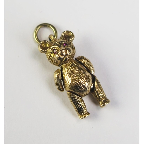 60 - A 9ct Gold Teddy Bear Articulated Pendant with red gem set eyes, 24mm drop, hallmarked, 4.36g