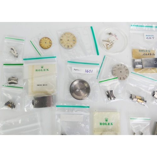 309 - A Selection of ROLEX Parts including bracelets, cases, dials, crowns, hands, etc.