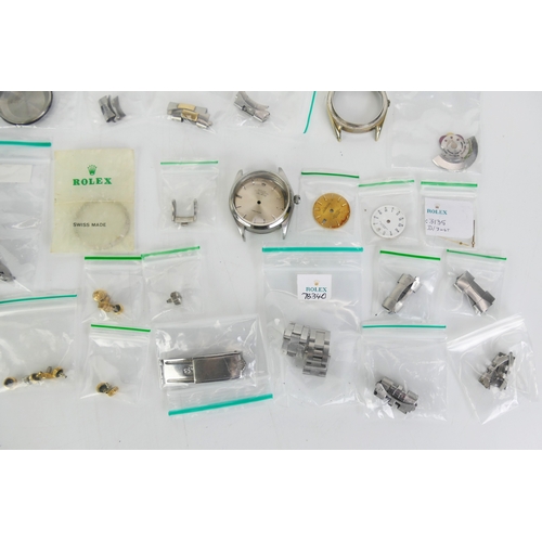 309 - A Selection of ROLEX Parts including bracelets, cases, dials, crowns, hands, etc.