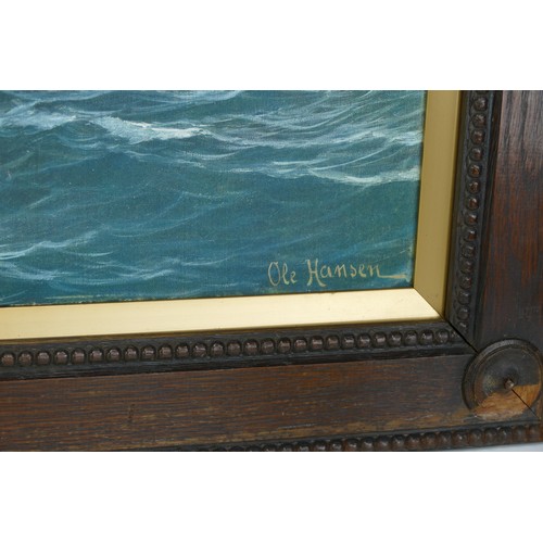 1425 - Ole Hansen twin masted schooner in a choppy sea with ships to the background.  Oil on board, signed,... 