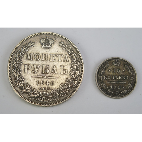 62 - A Nicolas I 1846 Russian Silver Ruble, St. Petersburg mint and a 1915 15 Kopeks coin