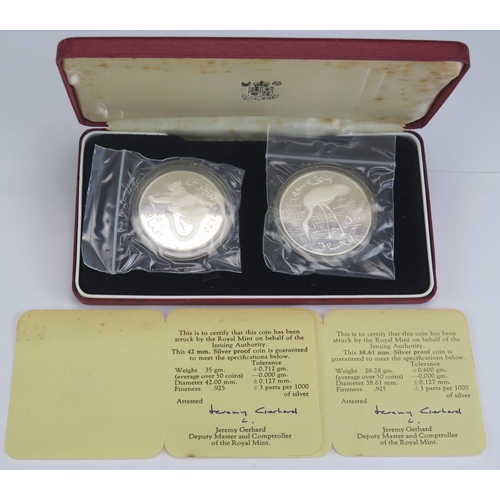 68 - A Royal Mint Cased Silver Two Coin Set Afghanistan 1978, boxed with COAs