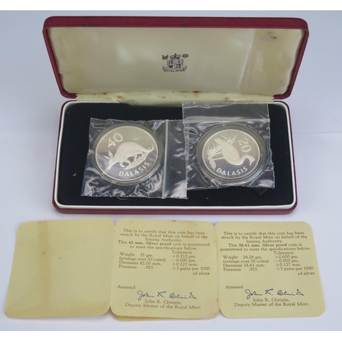 69 - A Royal Mint Cased Silver Two Coin Set Gambia 1977, boxed with COAs