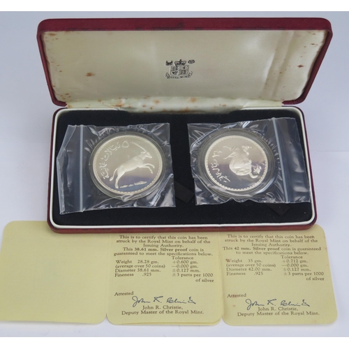 70 - A Royal Mint Cased Silver Two Coin Set Oman 1977, boxed with COAs