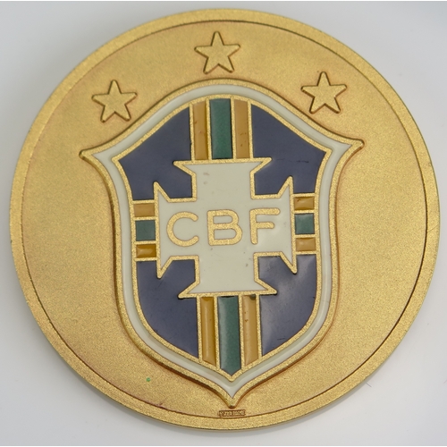 1 - A Brazilian gilt metal 10th anniversary medallion of the 1970 Mexico World Cup, obverse CBF enamel s... 