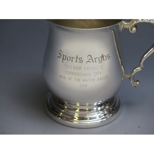 12 - A Sports Argus E.P.N.S. presentation mug, to Trevor Francis, Birmingham City, Man of The Match Award... 