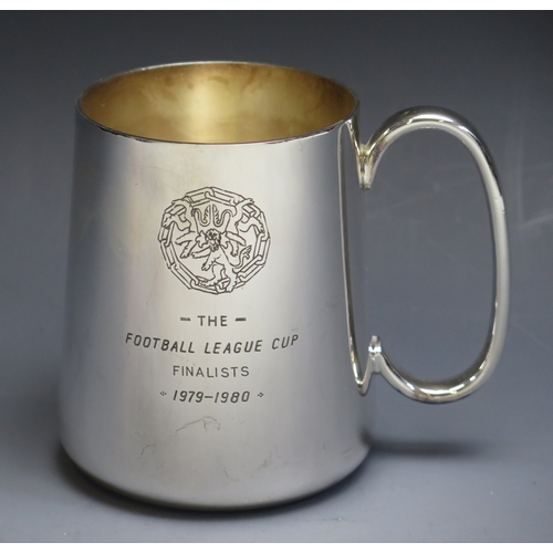 19 - An E.P.N.S. presentation mug inscribed “The Football League Cup Finalists 1979-1980” of plain cylind... 