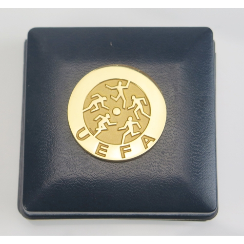 2 - An 18ct gold UEFA Youth Tournament winners medal, Spain 1972, obverse low relief circle of footballe... 