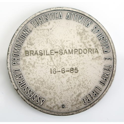 25A - A City of Genoa Tourist and Leisure Board, metal medallion inscribed Brasile-Sampdoria 16-6-86, and ... 