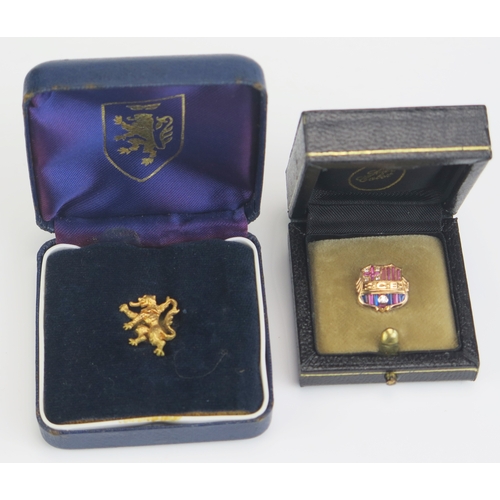 27 - A Barcelona Football Club diamond and gem set crest lapel badge, 14mm wide, in fitted case, together... 