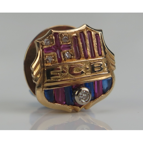 27 - A Barcelona Football Club diamond and gem set crest lapel badge, 14mm wide, in fitted case, together... 