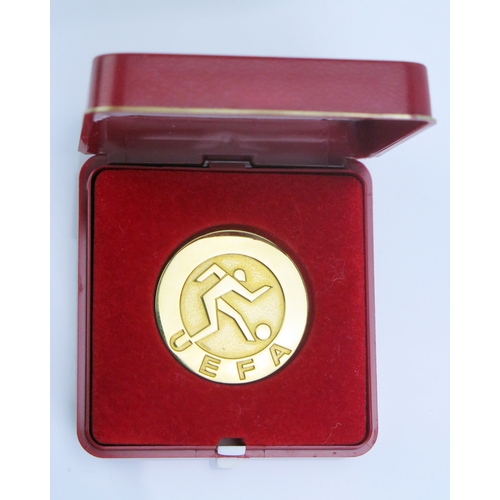 41 - A 1979 UEFA European Super Cup winners' medal awarded to Trevor Francis, obverse with footballer in ... 