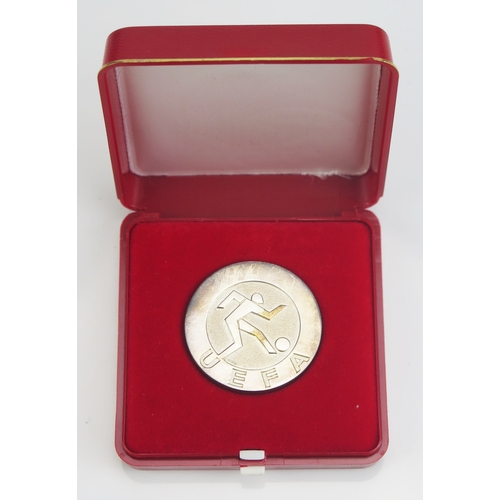 43 - A 1980 UEFA European Super Cup runners up silver medal awarded to Trevor Francis.  Obverse with foot... 