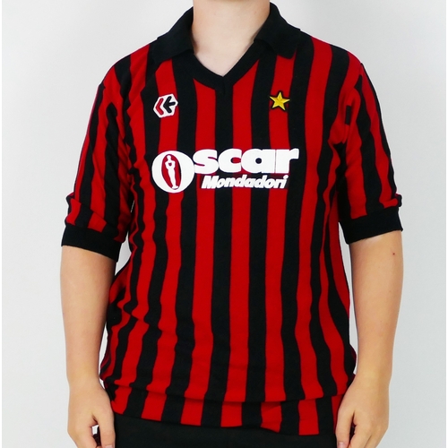 56 - An A C Milan 1984-85 season home shirt, Possibly Play worn and bears No. 8 for Ray Wilkins who made ... 