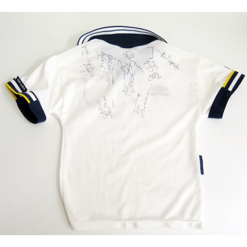 69 - A Tottenham Hotspur child’s shirt, signed by Osvaldo Ardiles and others.
*SOLD WITH A LETTER OF CONF... 