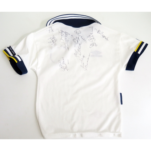 69 - A Tottenham Hotspur child’s shirt, signed by Osvaldo Ardiles and others.
*SOLD WITH A LETTER OF CONF... 