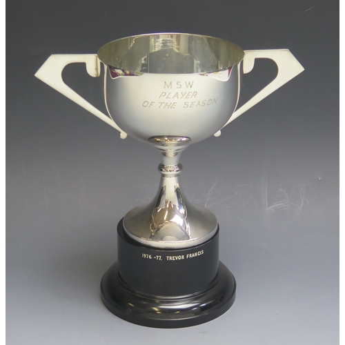 7 - An E.P.N.S. twin-handled presentation cup, inscribed “M.S.W. Player of The Season” on a plinth base ... 