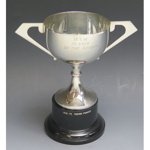 7 - An E.P.N.S. twin-handled presentation cup, inscribed “M.S.W. Player of The Season” on a plinth base ... 