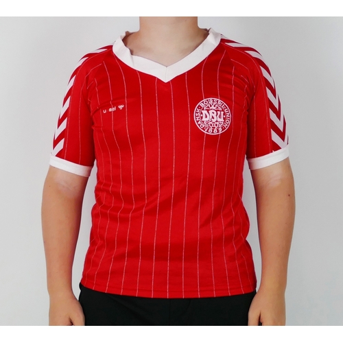 82 - A Denmark international home shirt 1983-84 bears No. 8 to the back for Jasper Olsen, for the 1984 Eu... 