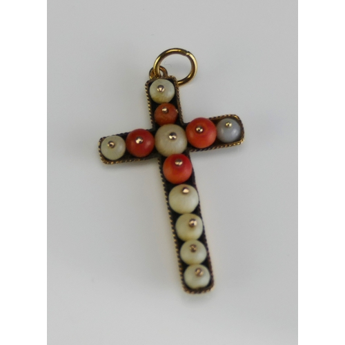 13 - An Antique Coral Set Cross Pendant in a precious yellow metal setting, 38.1mm drop, KEE tests as 14c... 