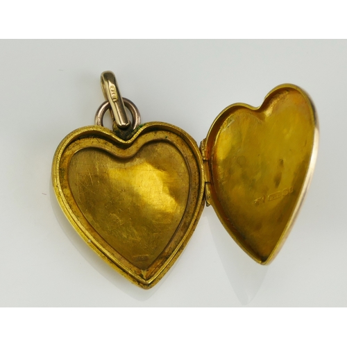 164 - A Large Victorian 9ct Gold Heart Shaped Locket with chased foliate decoration, 43.6mm drop, 26mm wid... 