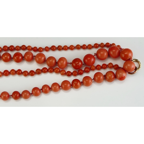 171 - A Coral Bead Necklace with 18ct Gold Clasp, largest bead 11.42mm, 102cm (40