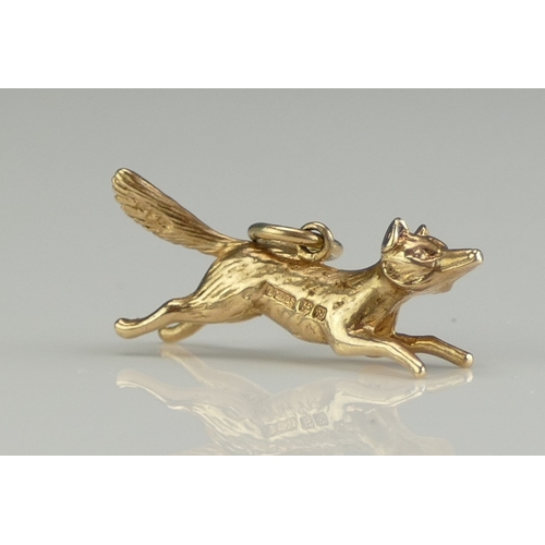 175 - A 9ct Gold Running Fox Charm, hallmarked, 2.22g