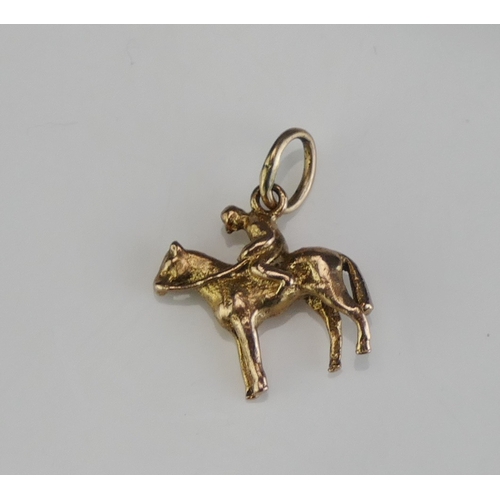 178 - A 9ct Gold Horse and Rider Charm, hallmarked, 1.63g