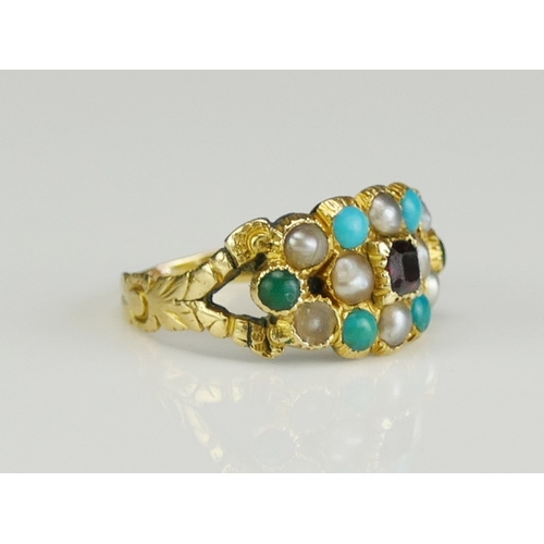 187 - A Georgian Garnet, Turquoise and Seed Pearl Ring in a high carat precious yellow metal setting, size... 