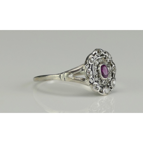 188 - An Antique Platinum, Ruby and Old Cut Diamond Ring, c. 13.2x11.9mm head, size S, 3.18g