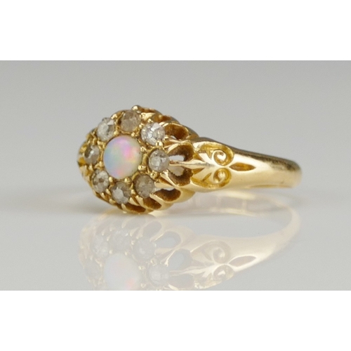 191 - An Antique 18ct Gold, Opal and Old Cut Diamond Ring, c. 8.8mm head, size K, Birmingham 1904, 3g